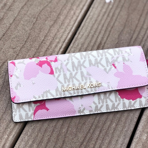 Michael Kors Handbags - NWT Michael Kors Signature floral flat wallet